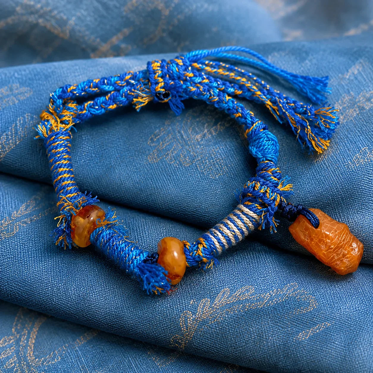 Tibetan-inspired intention jewelry guide for choosing a Kailora bracelet, mala, pendant, charm, or symbolic daily-wear piece