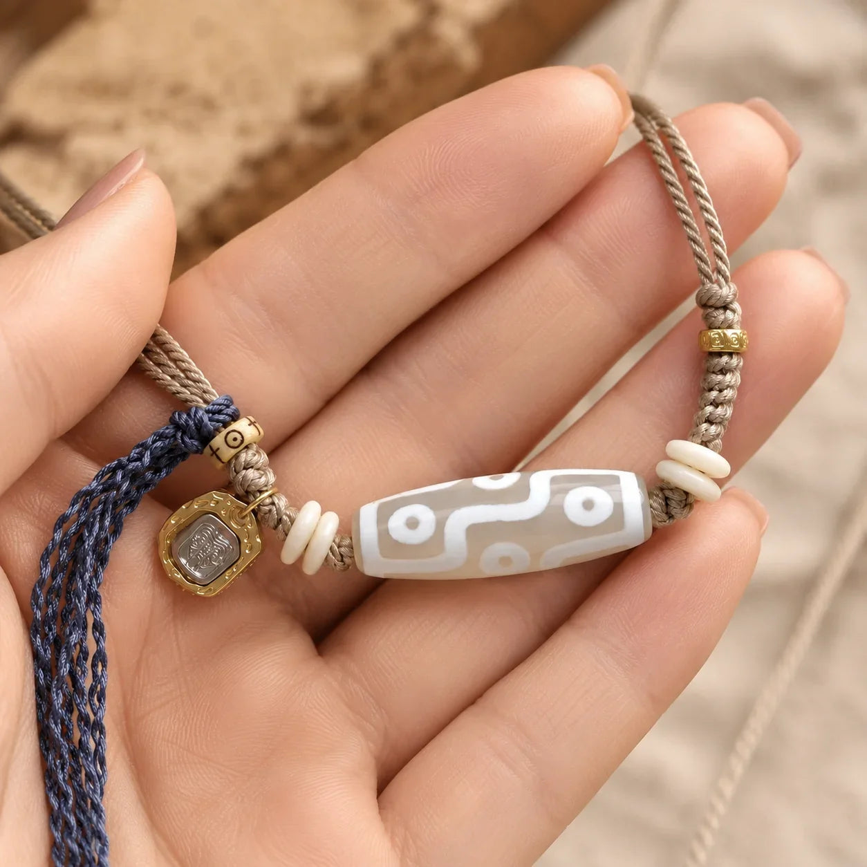 Nine-Eye Dzi agate cord necklace by Kailora