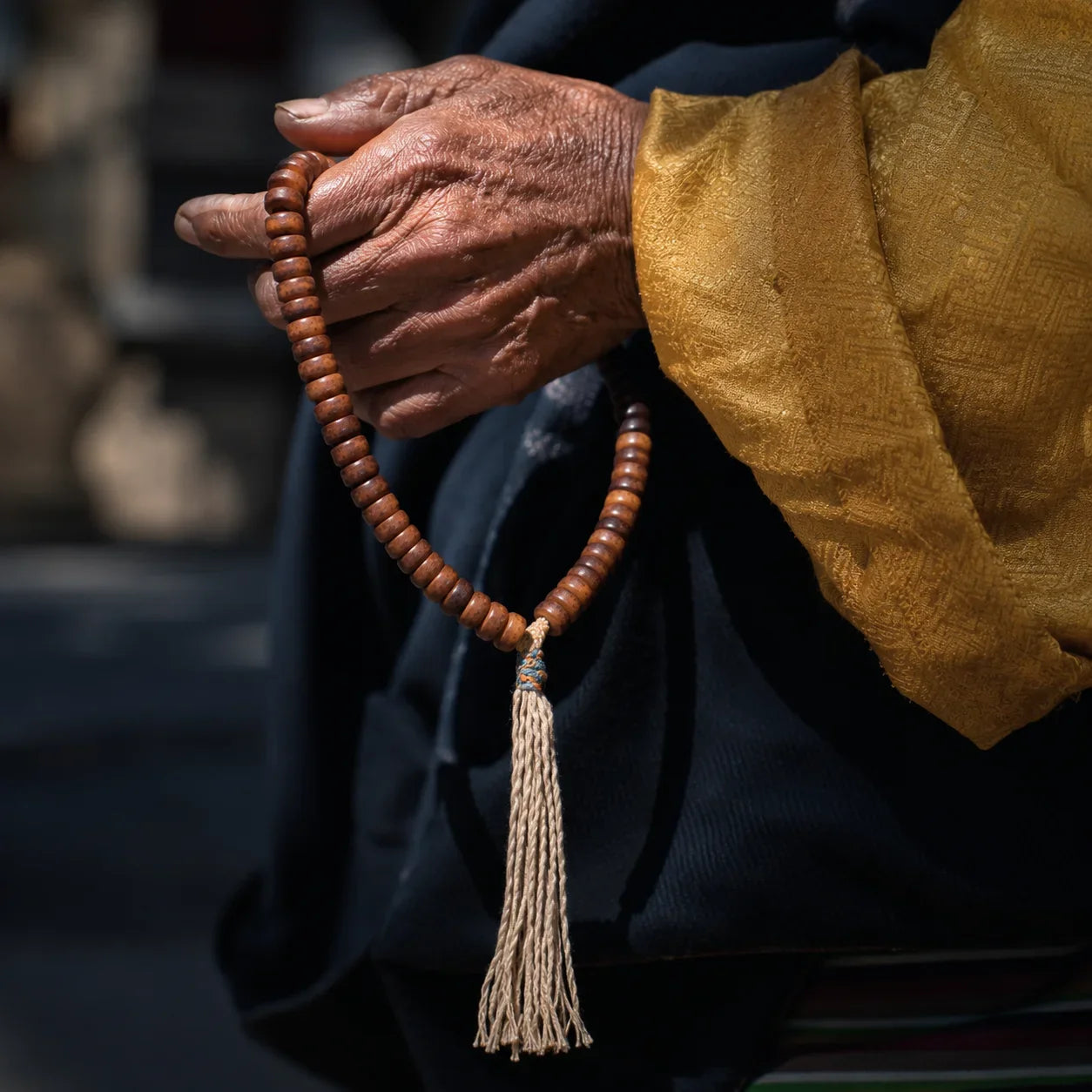 Kailora Tibetan-inspired yak bone 54-bead hand mala used to compare 54 and 108 mala bead formats
