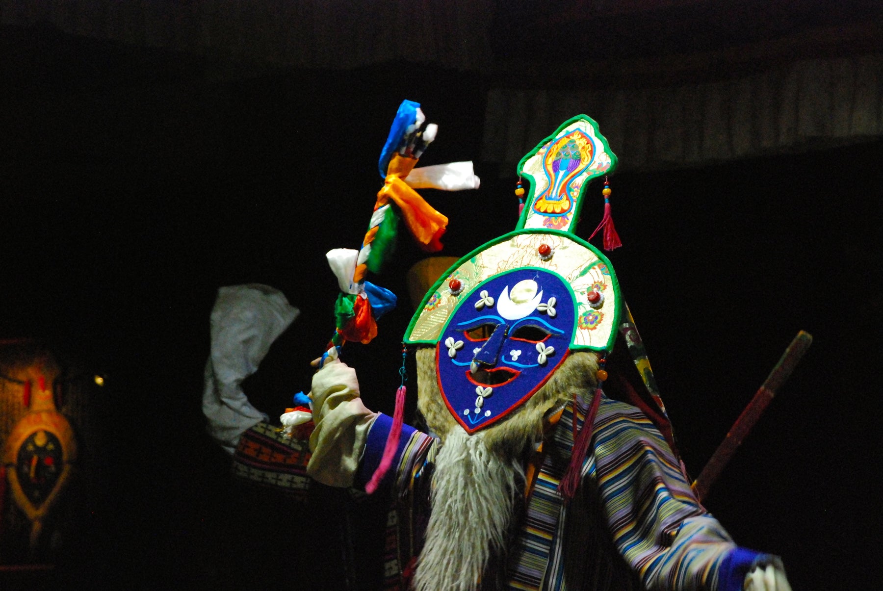 Tibetan opera performers in traditional costume, illustrating the Ache Lhamo tradition associated with Shoton Festival