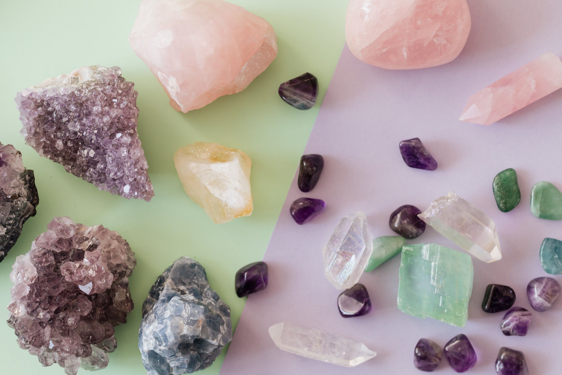 Assorted pink, purple, green and clear crystals illustrating different crystal color meanings