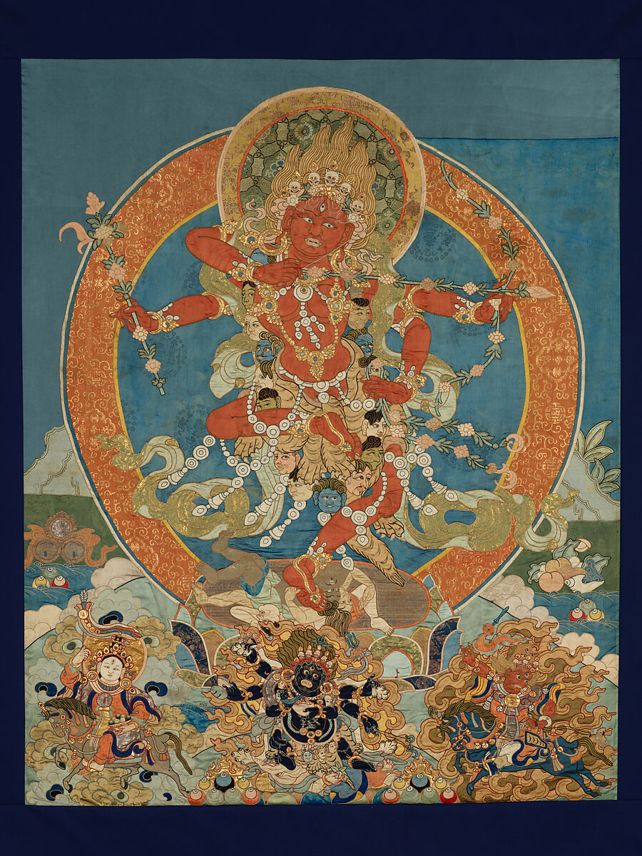 Tibetan appliqué thangka textile art with stitched silk and brocade