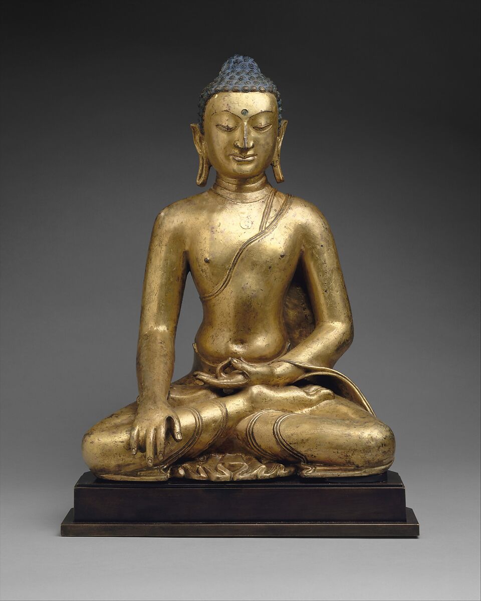 Tibetan Buddha sculpture showing an earth-touching mudra
