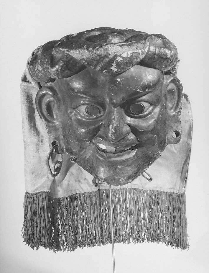 Historic Tibetan mask used as visual context for Tibetan performance traditions