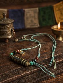 Kailora Tibetan Dzi Bead Necklace – Handwoven Cotton Cord for Intuition & Awakening