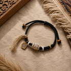 Kailora Tibetan Noble Dzi Agate Cord Bracelet with Zaki Lhamo Prosperity Charm thumbnail 1 | Kailora