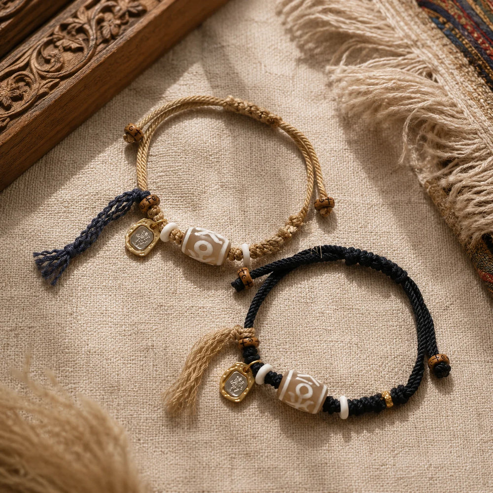 Kailora Tibetan Noble Dzi Agate Cord Bracelet with Zaki Lhamo Prosperity Charm detail view 4 | Kailora