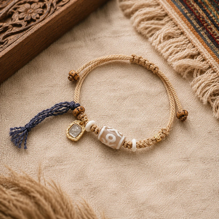 Tibetan-Inspired Dzi Agate Cord Bracelet with Zaki Lhamo Charm | Kailora detail view 2 | Kailora