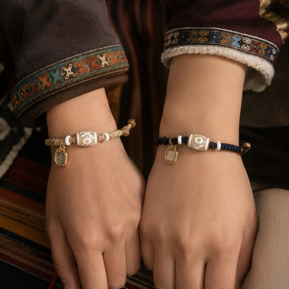 Kailora Tibetan Noble Dzi Agate Cord Bracelet with Zaki Lhamo Prosperity Charm detail view 3 | Kailora
