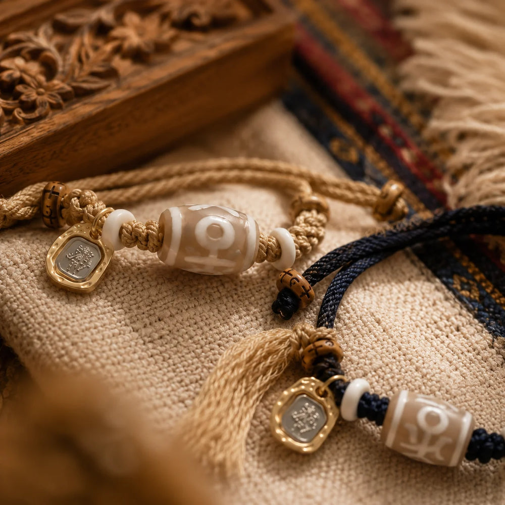 Kailora Tibetan Noble Dzi Agate Cord Bracelet with Zaki Lhamo Prosperity Charm detail view 6 | Kailora