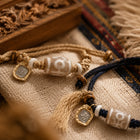 Kailora Tibetan Noble Dzi Agate Cord Bracelet with Zaki Lhamo Prosperity Charm thumbnail 6 | Kailora