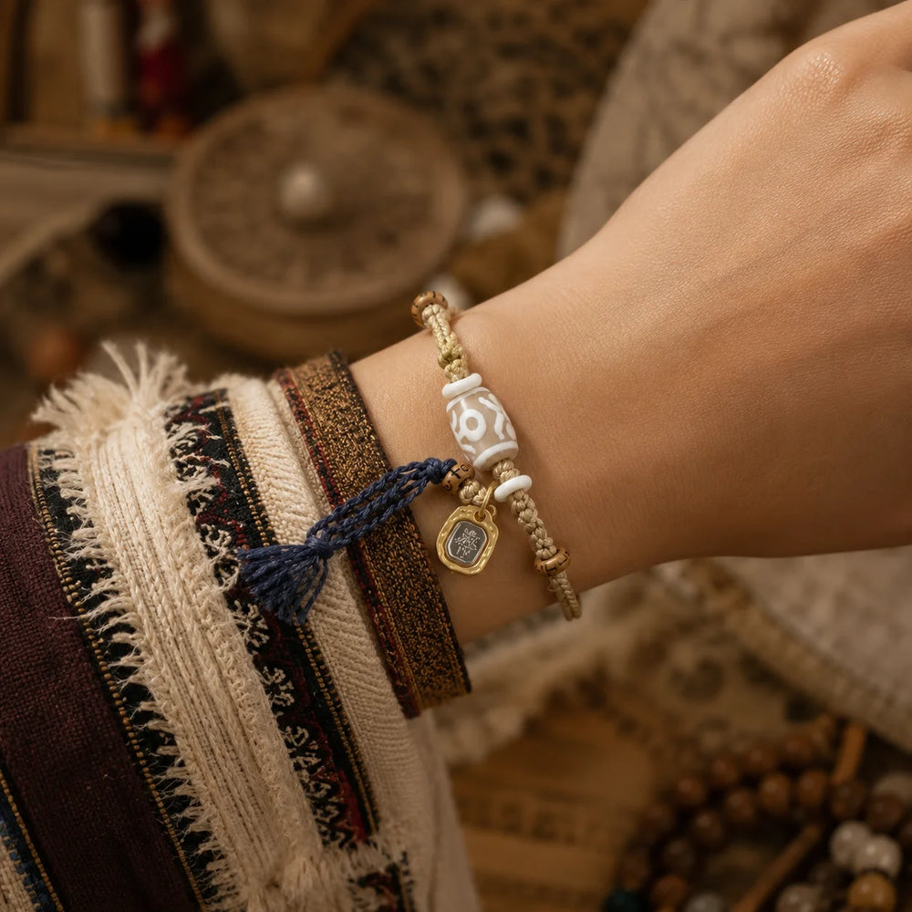Kailora Tibetan Noble Dzi Agate Cord Bracelet with Zaki Lhamo Prosperity Charm detail view 7 | Kailora