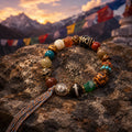 Close-up of three-eye Dzi agate bead details on Kailora bracelet thumbnail 2 | Kailora