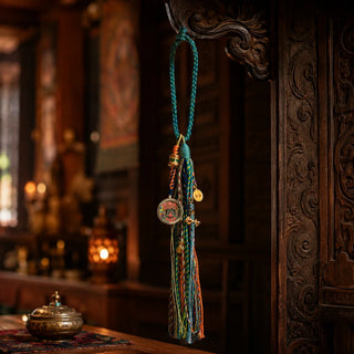Tibetan-inspired handmade Zaki Lhamo tassel charm front view by Kailora