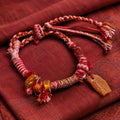Close-up of amber-style beads details on Kailora bracelet thumbnail 2 | Kailora