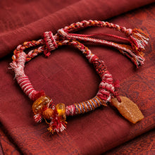 Kailora Tibetan Natural Amber Handwoven Cord Bracelet