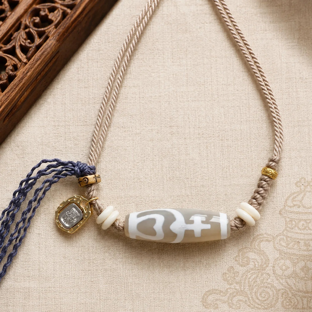 Kailora Tibetan Dzi Agate Cord Necklace | Zaki Lhamo Charm detail view 4 | Kailora