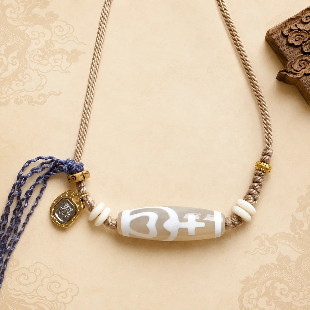 Kailora Tibetan Dzi Agate Cord Necklace | Zaki Lhamo Charm detail view 17 | Kailora