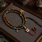 Tibetan-Inspired Yak Bone Hand Mala with Turquoise Accents thumbnail 3 | Kailora