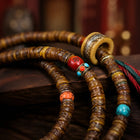 Tibetan-Inspired Yak Bone Hand Mala with Turquoise Accents thumbnail 6 | Kailora