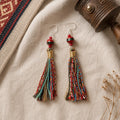 Color and tassel detail on Kailora Tibetan-inspired earrings thumbnail 6 | Kailora