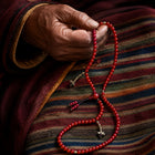 Tibetan-Inspired Red 108-Bead Hand Mala thumbnail 2 | Kailora