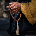 Tibetan-Inspired Yak Bone 54-Bead Hand Mala thumbnail 1 | Kailora