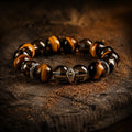 Eye of Insight bracelet with Tiger’s Eye and Smoky Quartz beads on dark stone thumbnail 4 | Kailora