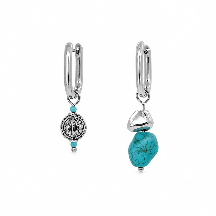 Kailora Tibetan-inspired asymmetric natural turquoise designer earrings on white background detail view 2 | Kailora