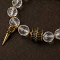 Close-up of clear quartz beads and textured antique brass centerpiece thumbnail 3 | Kailora