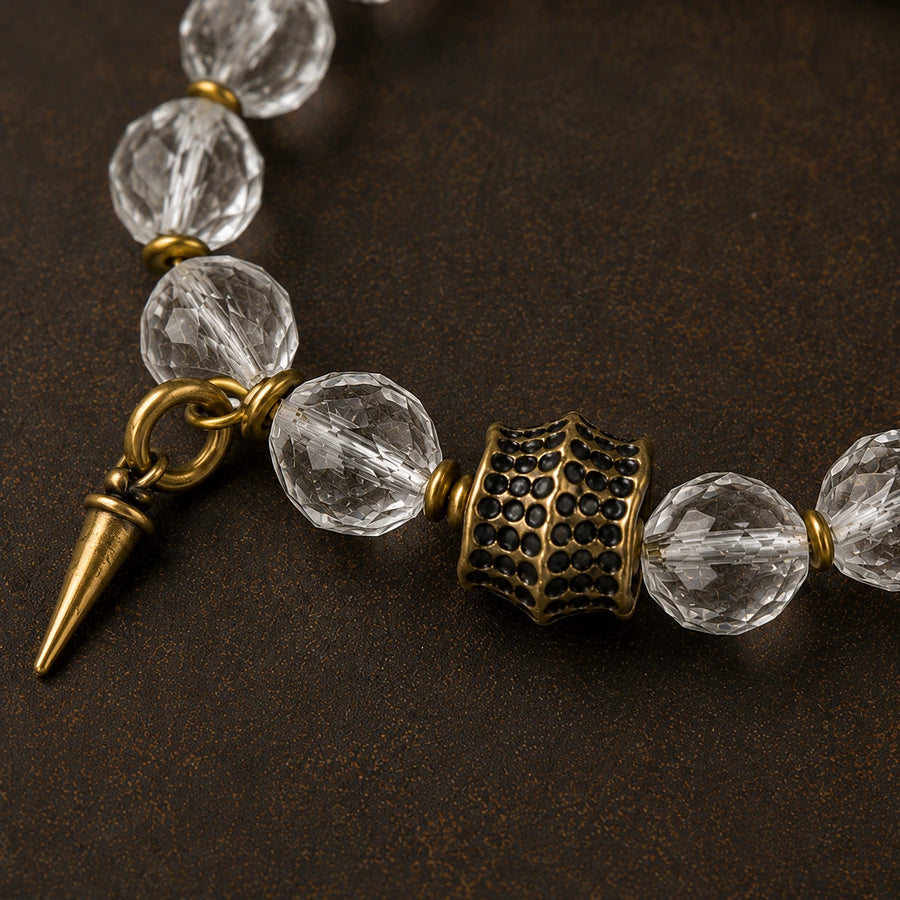 Close-up of clear quartz beads and textured antique brass centerpiece detail view 3 | Kailora