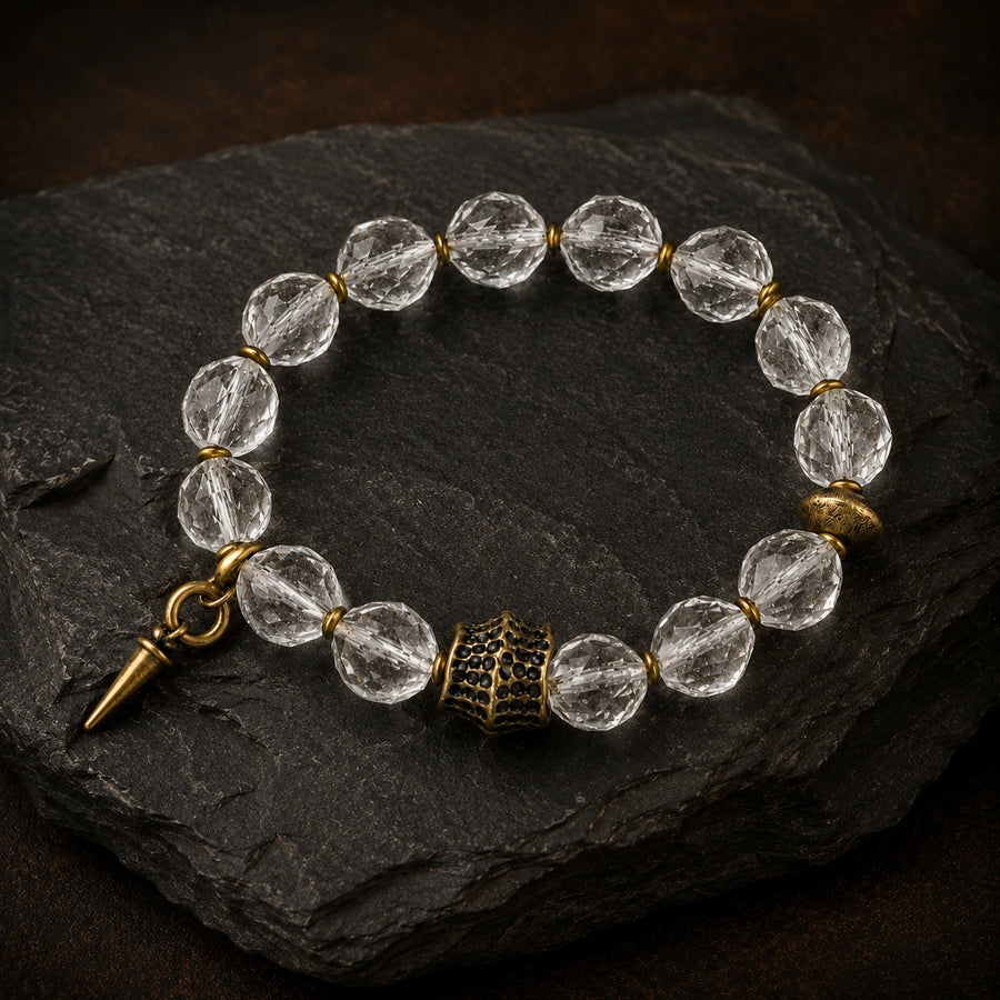 Tibetan-inspired clear quartz bracelet displayed on dark slate detail view 5 | Kailora