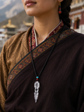 Close-up of natural clear quartz Phurba-inspired pendant on Kailora necklace thumbnail 2 | Kailora