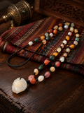 Handcrafted cord and bead details on Colorful Agate Necklace thumbnail 4 | Kailora