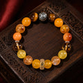 Kailora Dragon and Snake Chinese zodiac crystal bracelet handmade in Tibet with natural golden stones thumbnail 1 | Kailora