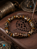Close-up of Dzi-style agate bead details on Kailora bracelet thumbnail 2 | Kailora