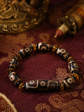 Elastic stretch construction and natural agate Dzi bead details on Kailora intuition bracelet thumbnail 4 | Kailora