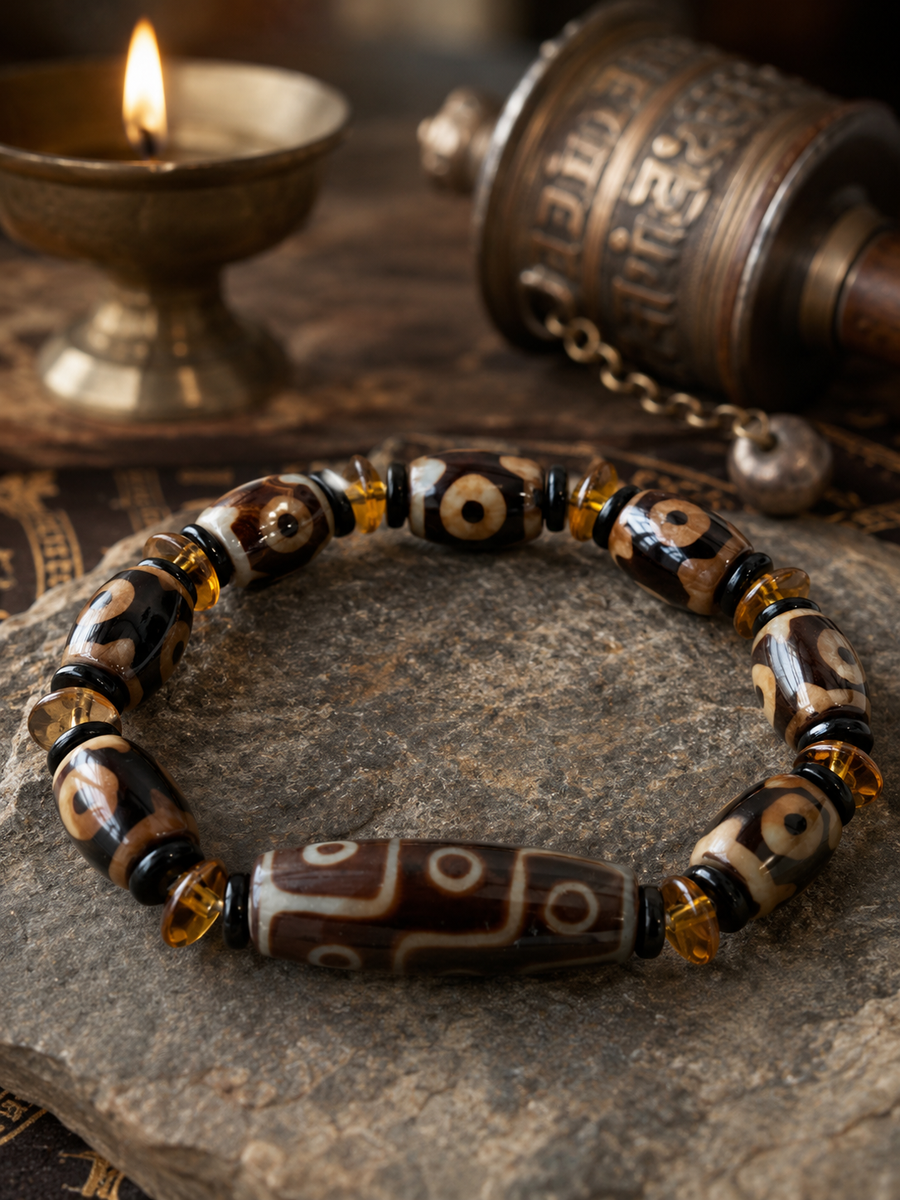 Tibetan-inspired styling image for Tibetan Dzi Agate Bracelet - Intuition & Awakening Series detail view 6 | Kailora