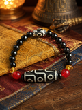 Tibetan-inspired styling image for Tibetan Dzi Bead Bracelet for Intuition & Awakening thumbnail 6 | Kailora