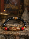Kailora Tibetan Dzi Bead Bracelet for Intuition & Awakening displayed with Tibetan-inspired background thumbnail 8 | Kailora