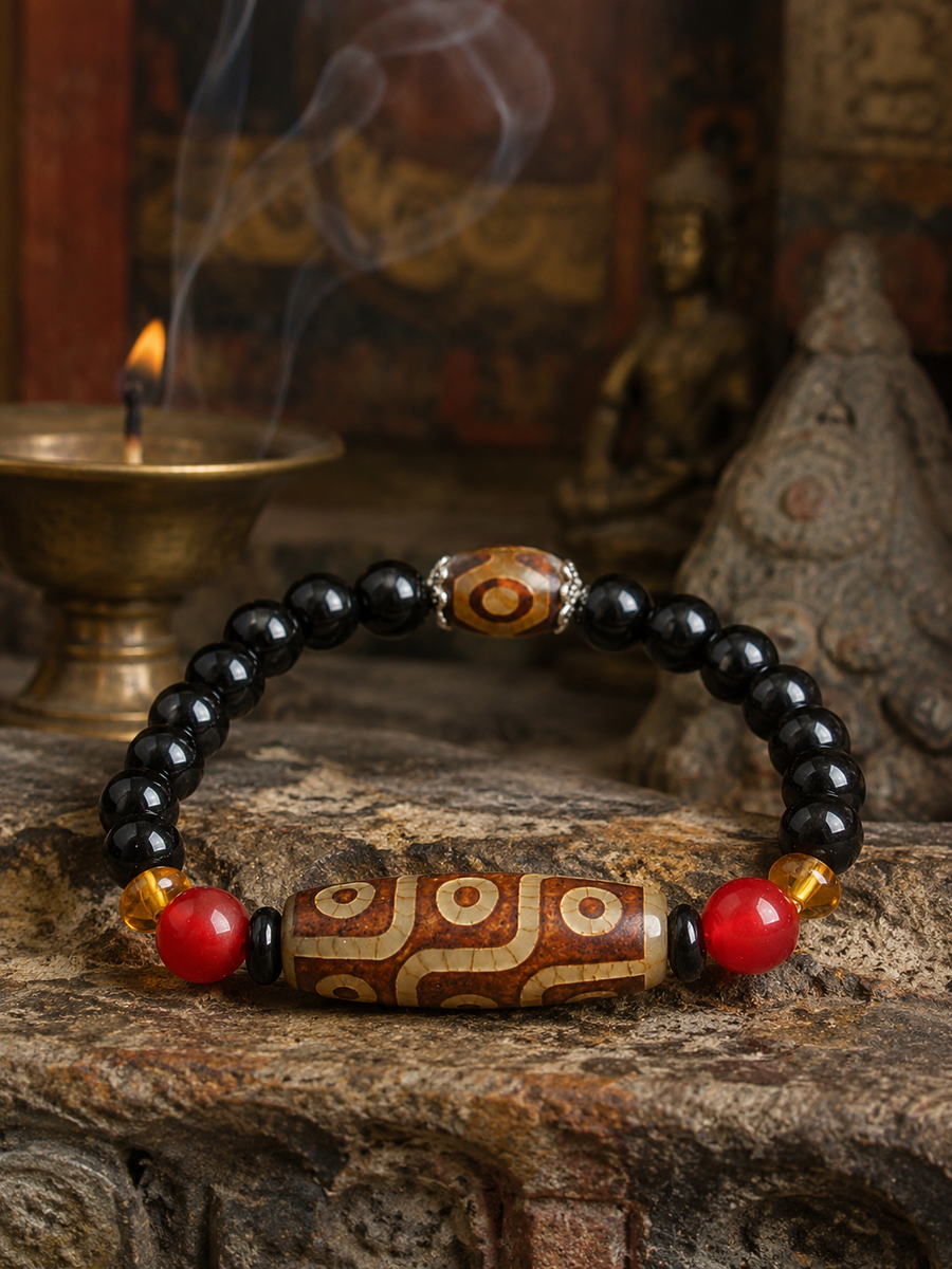 Kailora Tibetan Dzi Bead Bracelet for Intuition & Awakening displayed with Tibetan-inspired background detail view 8 | Kailora
