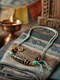 Tibetan-inspired styling image for Tibetan Dzi Bead Necklace thumbnail 6 | Kailora