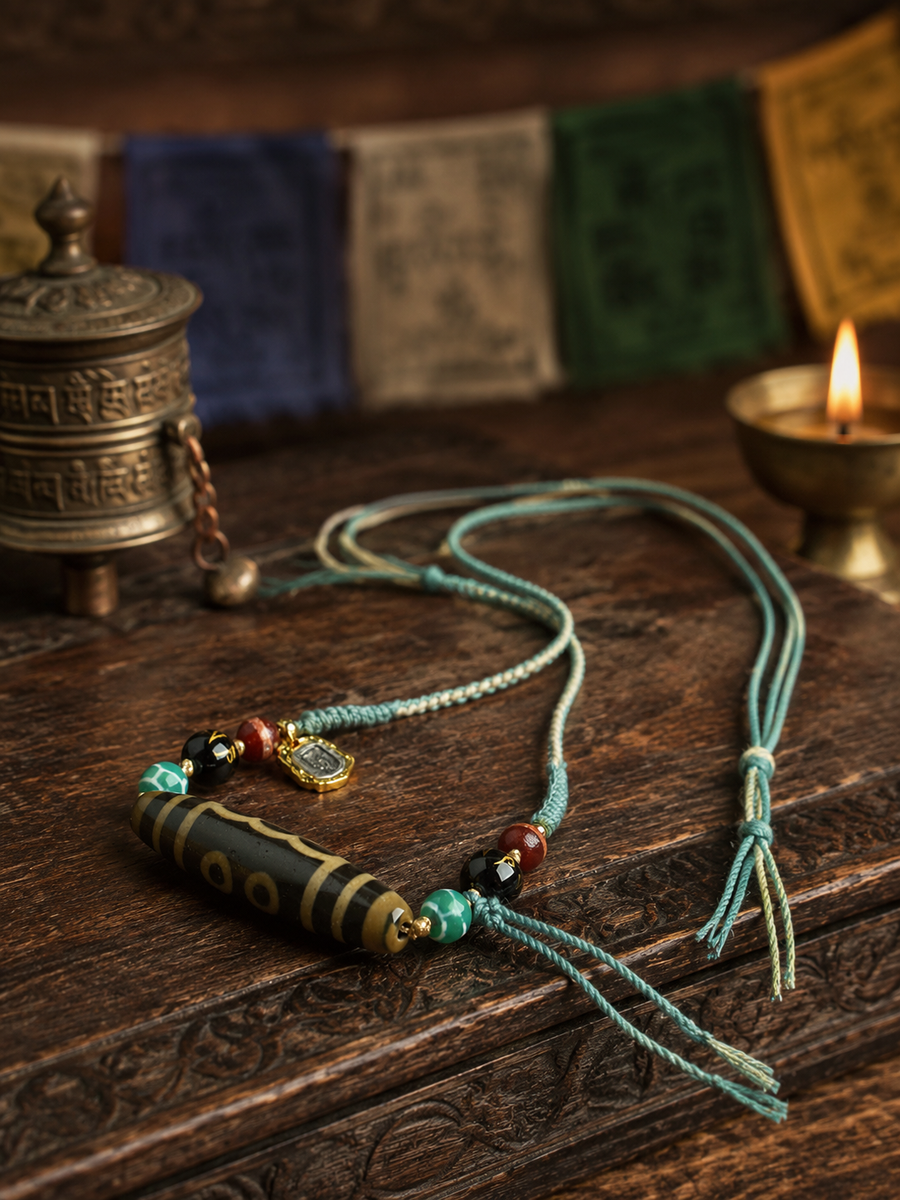 Detail view of Kailora natural agate Dzi cord necklace for intuition detail view 7 | Kailora
