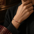 Kailora Tibetan five-color cord bracelet worn on a man's wrist thumbnail 9 | Kailora