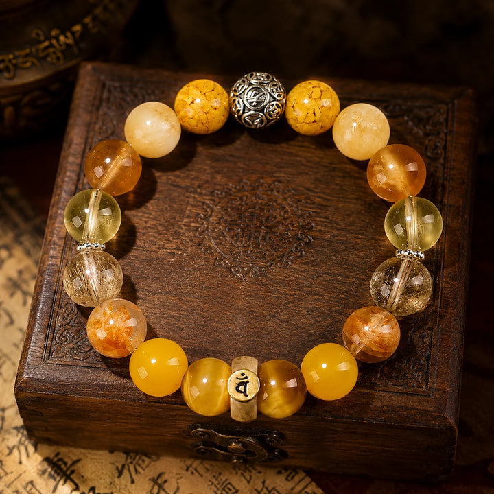 Kailora Goat and Monkey Chinese zodiac crystal bracelet handmade in Tibet with natural golden stones