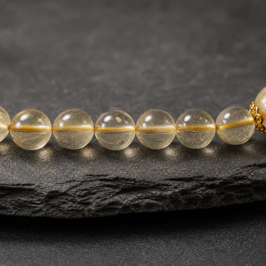 Macro detail of natural citrine beads with translucent golden tones and natural inclusions detail view 5 | Kailora