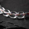 Close-up of natural clear quartz from Tibet with Five-Color Cord thumbnail 5 | Kailora