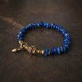 Angled view of lapis lazuli and brass bracelet by Kailora thumbnail 2 | Kailora