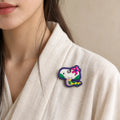 Model wearing Si Snake Chinese Zodiac hand-embroidered cotton-linen brooch handcrafted in Tibet thumbnail 27 | Kailora