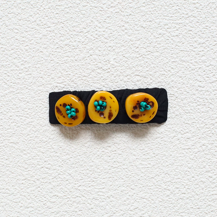 Tibetan handmade amber and turquoise three-disc hair clip detail view 2 | Kailora
